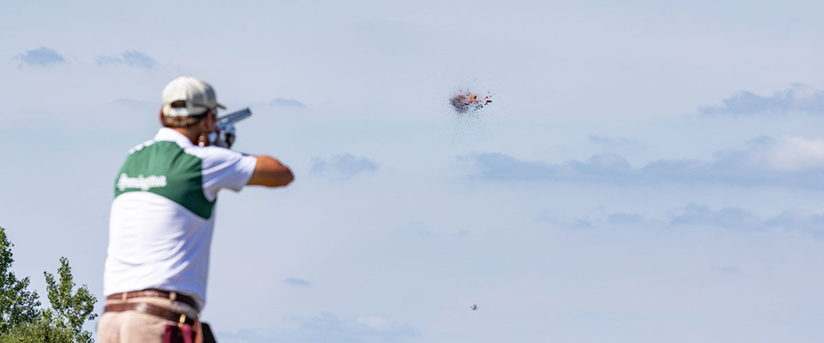 shooter shooting clay target in the air